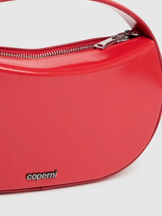 Coperni   Small Sound Swipe leather top handle bag 