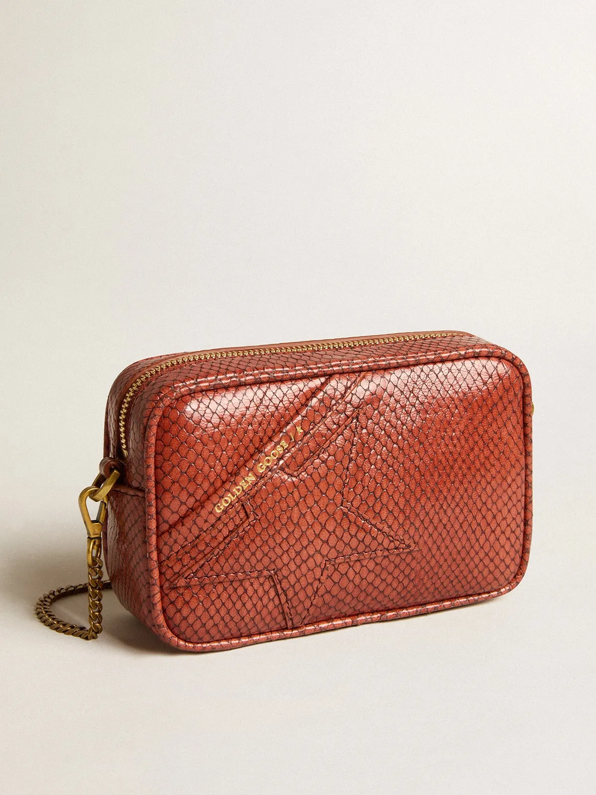 Mini Star Bag in rust-colored snake-print leather