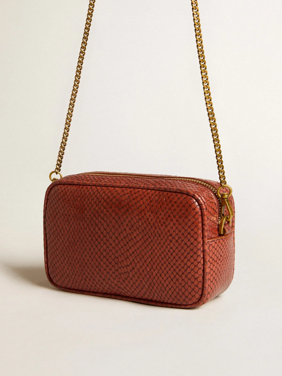 Mini Star Bag in rust-colored snake-print leather